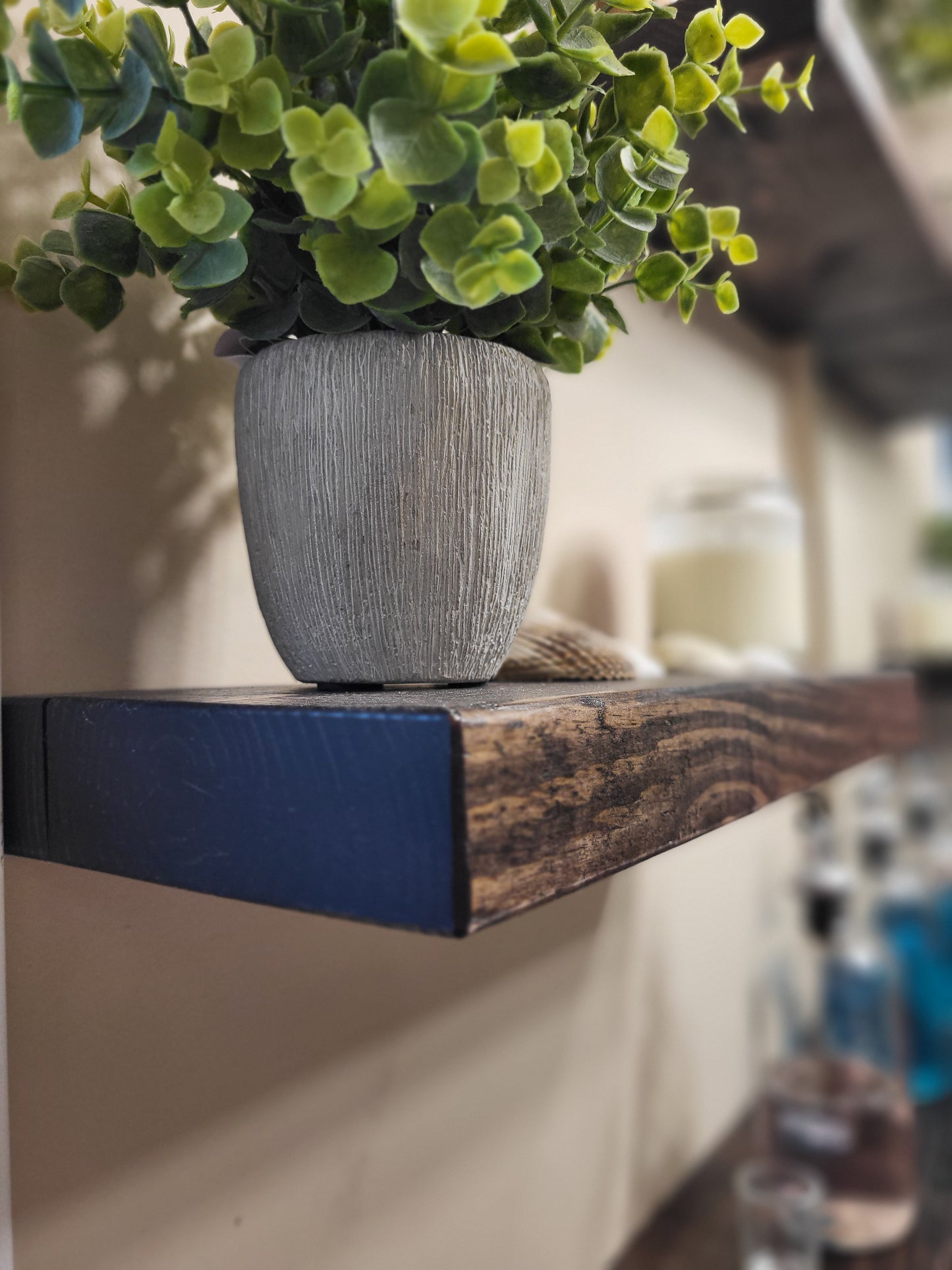 Closeup of a handcrafted floating wooden shelf made in Saskatoon, Saskatchewan