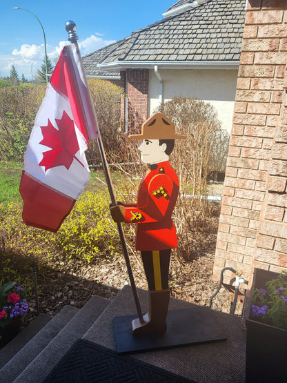 Side view of a freestanding wooden RCMP flag holder with Canadian flag